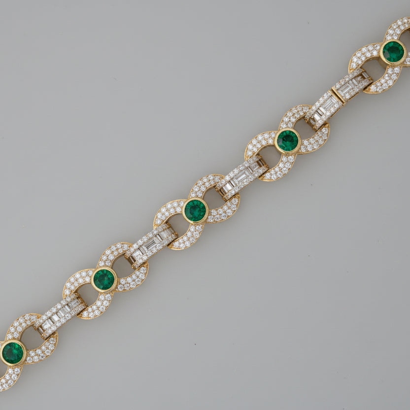 Emerald Accented Diamond Infinity Bracelet