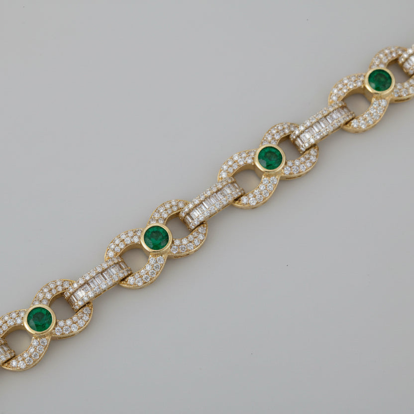 Emerald Accented Diamond Infinity Bracelet