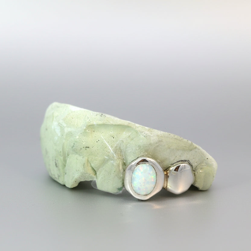 Dub cap with One Opal Tooth