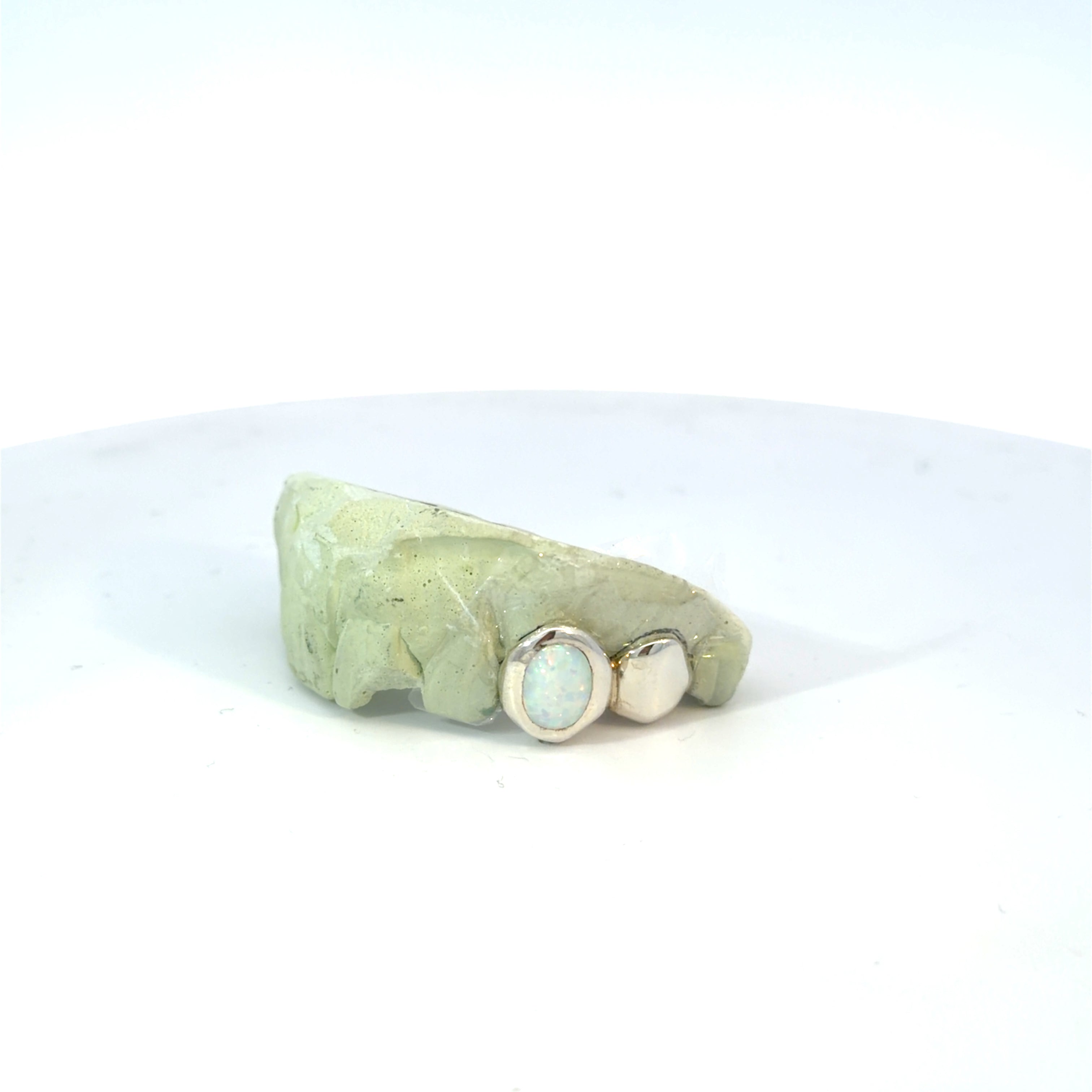 Dub cap with One Opal Tooth