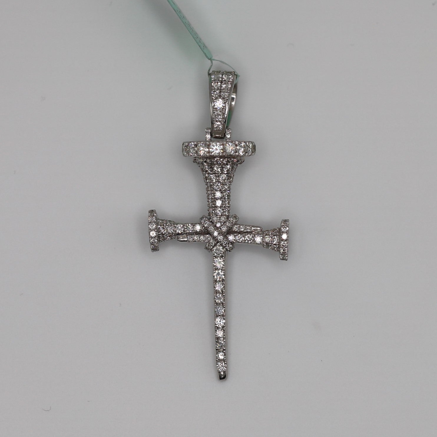 Diamond Nail Cross Pendant